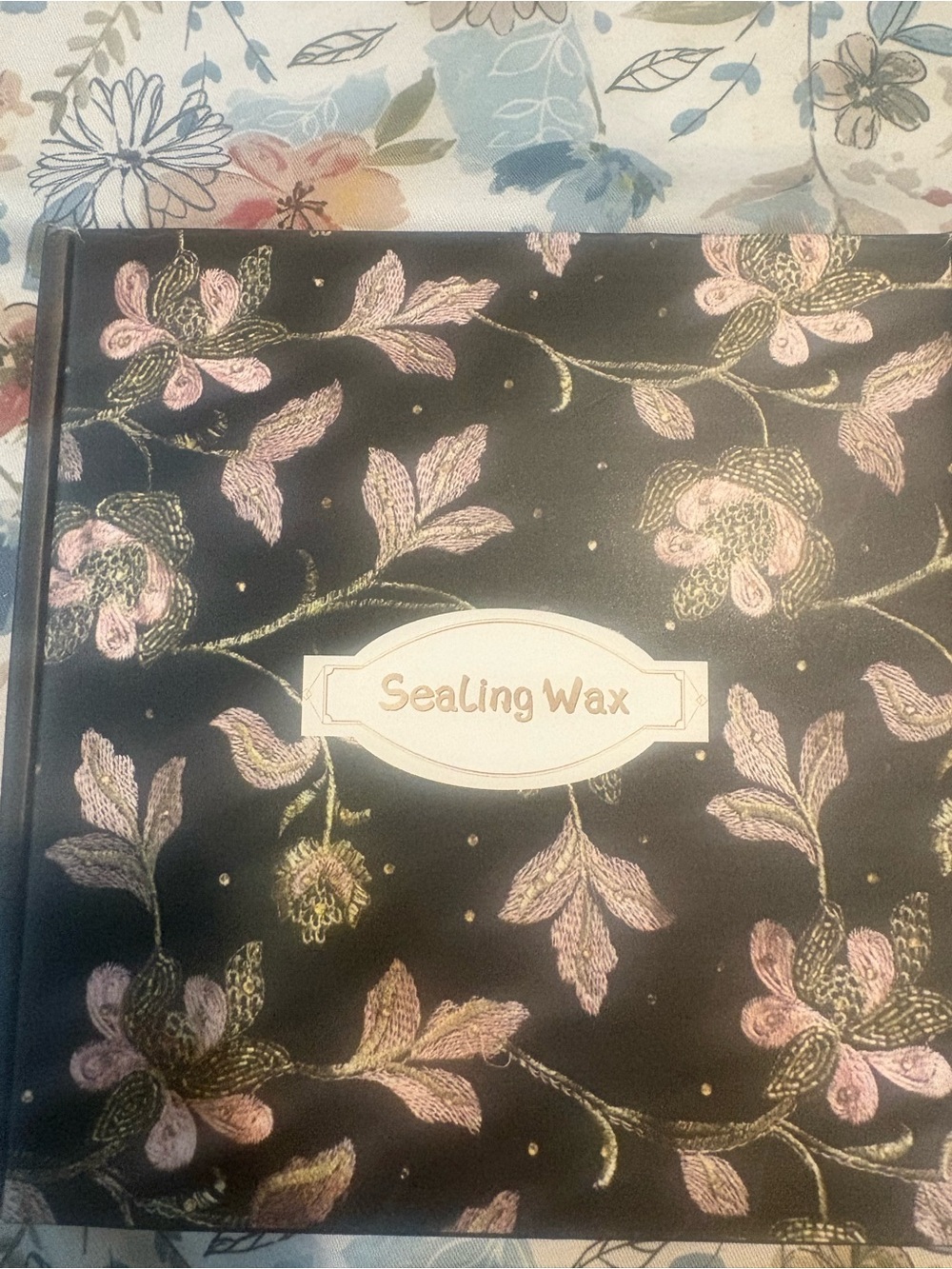 Source Unknown Black Sealing Wax Book with Pink and Gold Floral Embroidery